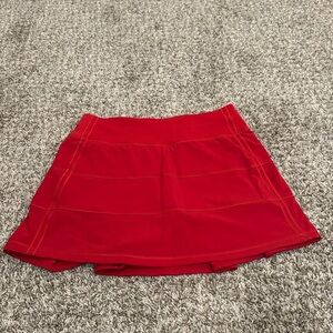 Lululemon Pace Rival Mid-Rise Skirt 
Size: 2 Long
Color: Red